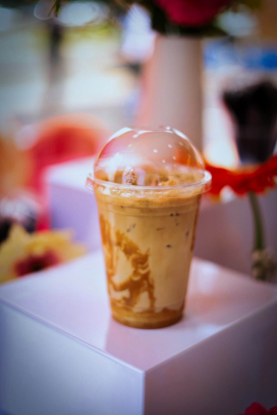 Iced latte drink in a clear cup