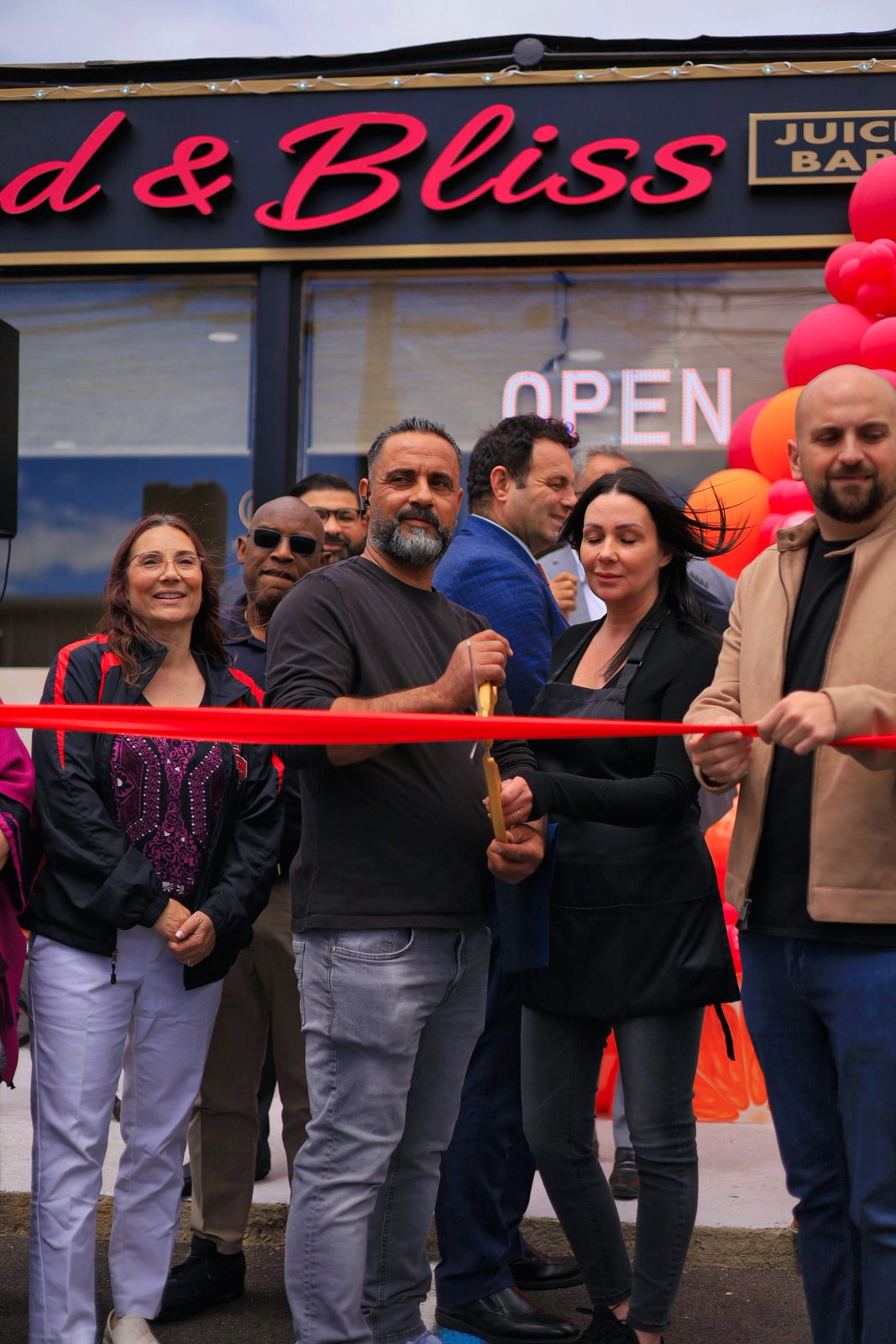 Ribbon cutting at the storefront
